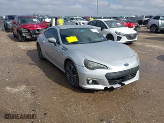 2014 Subaru BRZ Limited with VIN JF1ZCAC11E8604633, listed as a IAAI auction lot 41466704 with 142,025 mi miles. Bid and sale history available at carsss.com. Image 1.