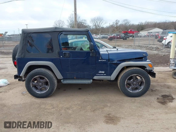2005 Jeep Wrangler Sport with VIN 1J4FA49S05P384308, listed as a IAAI auction lot 41821354 with 106,394 mi miles. Bid and sale history available at carsss.com. Image 13.