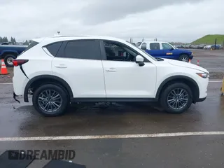 2020 Mazda CX-5 Touring with VIN JM3KFACM0L0738615, listed as a IAAI auction lot 41923923 with 52,599 mi miles. Bid and sale history available at carsss.com. Image 14.