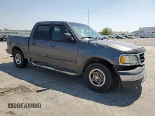 2003 Ford F-150 XLT with VIN 1FTRW07663KA63497, listed as a Copart auction lot 51658115 with 269,633 mi miles and Salvage Title. Bid and sale history available at carsss.com. Image 4.