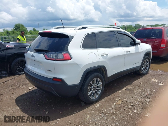 2020 Jeep Cherokee Latitude Plus with VIN 1C4PJLLB2LD592959, listed as a IAAI auction lot 42491266 with 74,609 mi miles and . Bid and sale history available at DreamBid. Image 4.