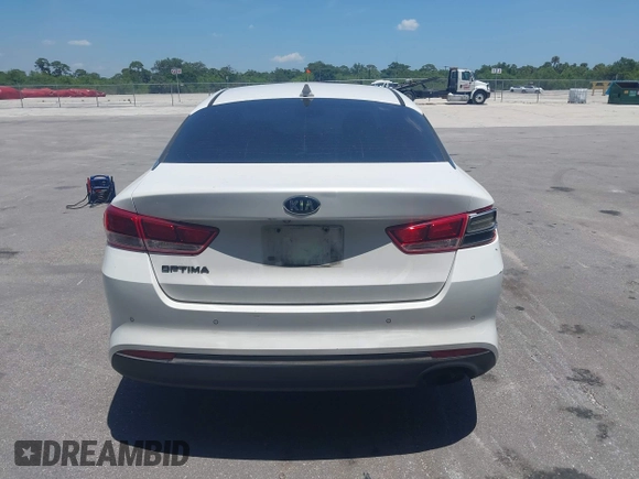 2018 Kia Optima S with VIN 5XXGT4L35JG251681, listed as a IAAI auction lot 42302319 with 154,612 mi miles and . Bid and sale history available at DreamBid. Image 16.