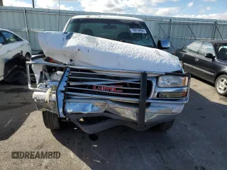 1999 GMC New Sierra 1500 SLE with VIN 2GTEK19T7X1570742, listed as a Copart auction lot 79016454 with 246,437 mi miles and Salvage Title. Bid and sale history available at carsss.com. Image 5.