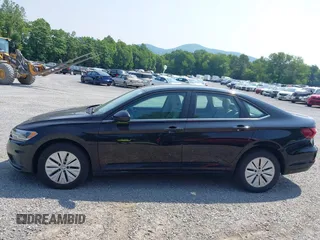 2019 Volkswagen Jetta S z VIN 3VWC57BU6KM084104, wystawiony jako IAAI lot #42423409 z przebiegiem 115 398 mil mil oraz . Historia ofert i sprzedaży dostępna na DreamBid. Obrazek 14.