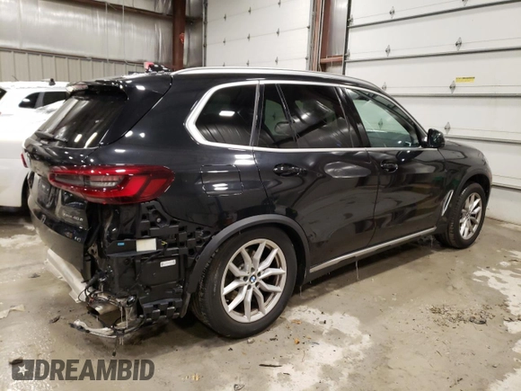 2021 BMW X5 xDrive45e with VIN 5UXTA6C01M9H41785, listed as a Copart auction lot 65762372 with 8,143 mi miles. Bid and sale history available at carsss.com. Image 3.