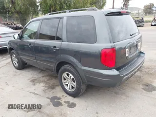 2004 Honda Pilot EX with VIN 2HKYF18494H619509, listed as a IAAI auction lot 42056926 with 185,600 mi miles and . Bid and sale history available at DreamBid. Image 3.
