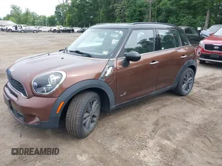 2014 MINI Countryman S z VIN WMWZC5C5XEWP38408, wystawiony jako IAAI lot #42360746 z przebiegiem 136 266 mil mil oraz . Historia ofert i sprzedaży dostępna na DreamBid. Obrazek 2.