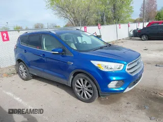 2017 Ford Escape Titanium with VIN 1FMCU0JD1HUA30076, listed as a IAAI auction lot 42024777 with 110,467 mi miles. Bid and sale history available at carsss.com. Image 1.