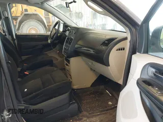 2016 Dodge Grand Caravan SE with VIN 2C4RDGBG1GR117200, listed as a IAAI auction lot 42104773 with 121,007 mi miles and . Bid and sale history available at DreamBid. Image 5.