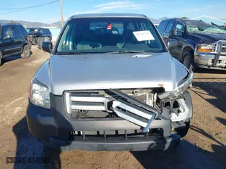 2006 Honda Pilot LX with VIN 2HKYF18156H556689, listed as a IAAI auction lot 40792236 with 273,856 mi miles. Bid and sale history available at carsss.com. Image 13.