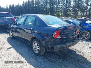 2002 Ford Focus SE with VIN 1FAFP34302W167735, listed as a IAAI auction lot 42056931 with 303,295 mi miles and . Bid and sale history available at carsss.com. Image 3.