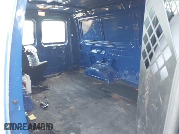 2005 Ford Econoline Cargo with VIN 1FTNE24W25HA44320, listed as a IAAI auction lot 41336276 with 236,671 mi miles. Bid and sale history available at carsss.com. Image 8.