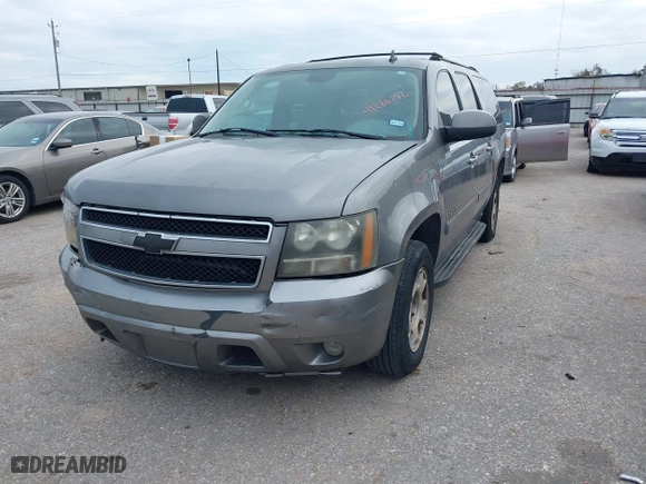 2007 Chevrolet Suburban LTZ with VIN 1GNFC16047J236158, listed as a IAAI auction lot 41266792 with 1 mi miles. Bid and sale history available at carsss.com. Image 2.