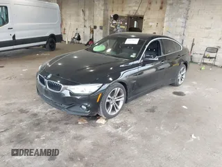 2016 BMW 4 Series 428i xDrive with VIN WBA4C9C58GG139151, listed as a IAAI auction lot 42151827 with 92,698 mi miles and . Bid and sale history available at DreamBid. Image 2.