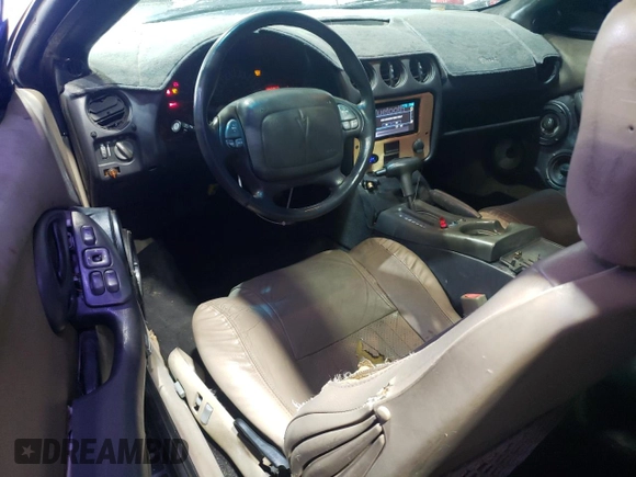 1999 Pontiac Firebird Formula с VIN 2G2FV22G1X2211237, выставлен на аукционе Copart как лот 57750415 с пробегом 134 236 миль миль и Списание • Salvage title. История ставок и продаж доступна на DreamBid. Изображение 8.