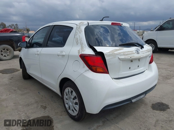 2015 Toyota Yaris L with VIN VNKKTUD39FA027316, listed as a IAAI auction lot 39022940 with 110,063 mi miles and . Bid and sale history available at DreamBid. Image 3.