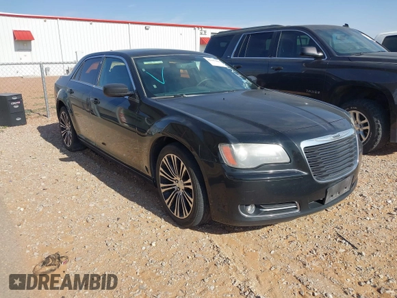 2014 Chrysler 300 S with VIN 2C3CCABG5EH205020, listed as a IAAI auction lot 42247180 with 186,458 mi miles and . Bid and sale history available at DreamBid. Image 1.