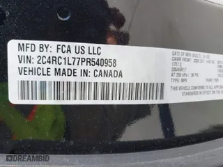 2023 Chrysler Pacifica Hybrid Touring L with VIN 2C4RC1L77PR540958, listed as a IAAI auction lot 42010484 with 61,166 mi miles. Bid and sale history available at carsss.com. Image 9.