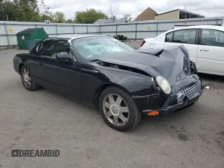 2005 Ford Thunderbird Deluxe z VIN 1FAHP60A55Y102032, wystawiony jako Copart lot #73761144 z przebiegiem 50 402 mil mil oraz Szkoda całkowita • Salvage title. Historia ofert i sprzedaży dostępna na DreamBid. Obrazek 4.
