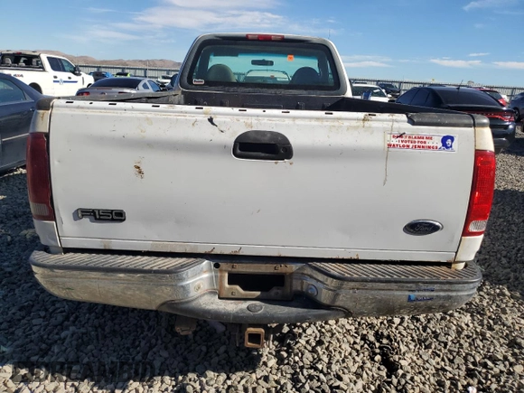 1999 Ford F-150 z VIN 1FTRF18W1XKA87801, wystawiony jako Copart lot #79094454 z przebiegiem Nie podano mil oraz Szkoda całkowita • Salvage title. Historia ofert i sprzedaży dostępna na DreamBid. Obrazek 6.