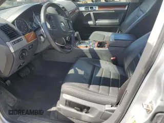 2010 Volkswagen Touareg VR6 with VIN WVGBF7A97AD004355, listed as a Copart auction lot 52861335 with 129,454 mi miles and Salvage Title. Bid and sale history available at DreamBid. Image 7.