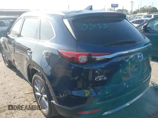 2020 Mazda CX-9 Grand Touring with VIN JM3TCADY0L0422548, listed as a IAAI auction lot 41839601 with 116,952 mi miles and . Bid and sale history available at DreamBid. Image 3.