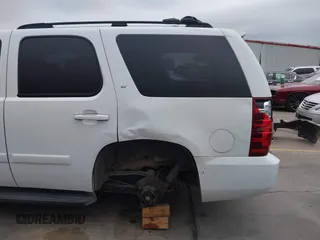 2007 Chevrolet Tahoe LS with VIN 1GNFC13J97R281157, listed as a IAAI auction lot 42167329 with Not provided miles and . Bid and sale history available at DreamBid. Image 21.
