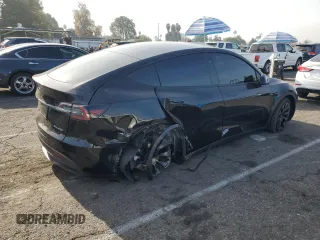 2024 Tesla Model Y Long Range with VIN 7SAYGDEE5RF060707, listed as a Copart auction lot 87288784 with Not provided miles and Salvage title. Bid and sale history available at DreamBid. Image 3.