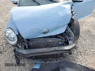 2012 Volkswagen Beetle 2.5L PZEV with VIN 3VWJP7AT3CM628005, listed as a Copart auction lot 68876134 with 124,958 mi miles and Salvage Title. Bid and sale history available at carsss.com. Image 12.