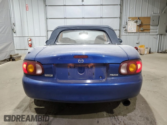1999 Mazda MX-5 Miata with VIN JM1NB3532X0136645, listed as a Copart auction lot 59480265 with 160,936 mi miles and Clean title. Bid and sale history available at DreamBid. Image 6.
