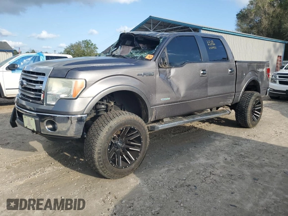 2013 Ford F-150 XL with VIN 1FTFW1ET1DKG19931, listed as a Copart auction lot 51185555 with Not Provided miles and Salvage Title. Bid and sale history available at carsss.com. Image 1.