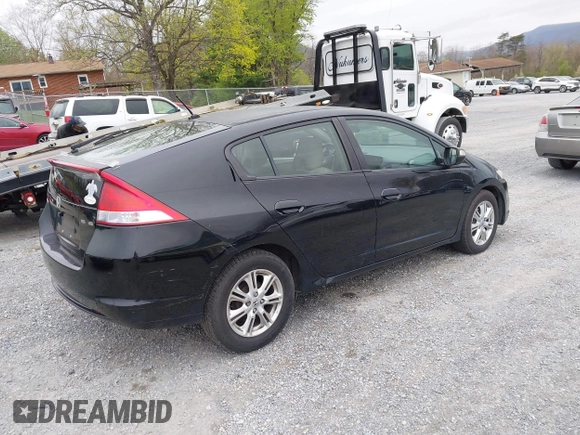 2010 Honda Insight EX with VIN JHMZE2H73AS002299, listed as a IAAI auction lot 41900761 with 251,934 mi miles and . Bid and sale history available at DreamBid. Image 4.