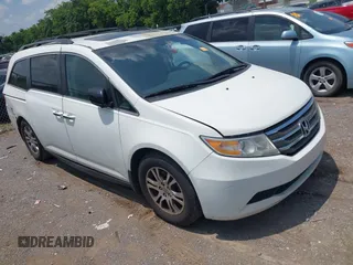 2012 Honda Odyssey EX-L with VIN 5FNRL5H63CB063684, listed as a IAAI auction lot 42576742 with 170,656 mi miles and . Bid and sale history available at DreamBid. Image 13.