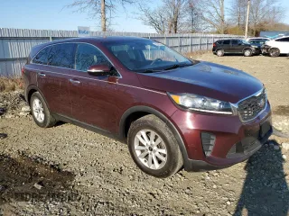 2019 Kia Sorento L with VIN 5XYPG4A3XKG448754, listed as a Copart auction lot 47989245 with 125,461 mi miles and Salvage Title. Bid and sale history available at DreamBid. Image 4.