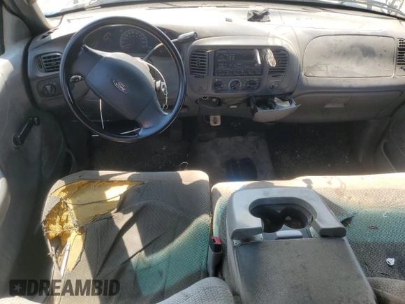 2004 Ford F-150 XL with VIN 2FTRX17W54CA63466, listed as a Copart auction lot 64022895 with 329,377 mi miles and Salvage title. Bid and sale history available at DreamBid. Image 8.