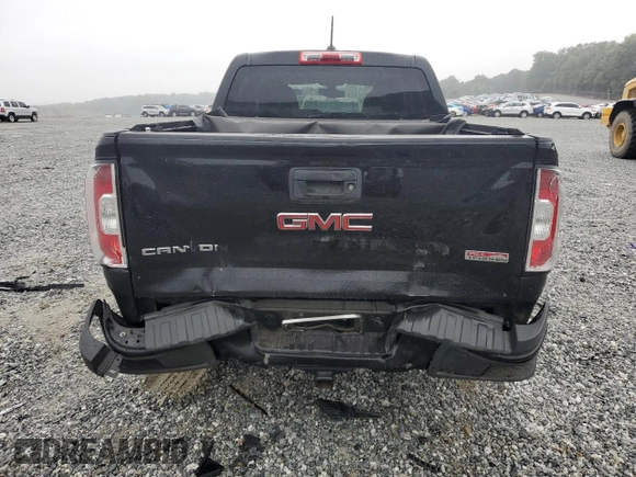 2015 GMC Canyon 4WD SLE with VIN 1GTG6BE37F1157166, listed as a Copart auction lot 71279914 with 114,484 mi miles and Salvage Title. Bid and sale history available at carsss.com. Image 6.