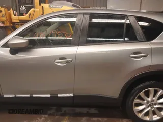 2014 Mazda CX-5 Grand Touring with VIN JM3KE4DY5E0305882, listed as a IAAI auction lot 41879532 with 173,443 mi miles. Bid and sale history available at carsss.com. Image 14.