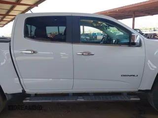 2018 GMC Canyon 4WD Denali z VIN 1GTP6EE11J1178961, wystawiony jako IAAI lot #42499884 z przebiegiem 71 309 mil mil oraz . Historia ofert i sprzedaży dostępna na DreamBid. Obrazek 13.