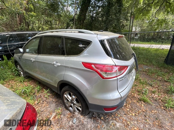 2016 Ford Escape Titanium with VIN 1FMCU9JXXGUC33190, listed as a Copart auction lot 51374865 with 222,129 mi miles and Clean Title. Bid and sale history available at carsss.com. Image 3.