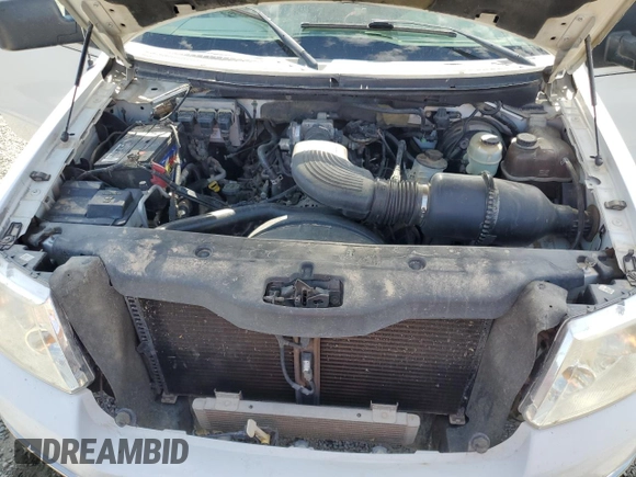 2004 Ford F-150 STX z VIN 1FTRX12WX4NA69734, wystawiony jako Copart lot #62692495 z przebiegiem 134 678 mil mil oraz Szkoda całkowita • Salvage title. Historia ofert i sprzedaży dostępna na DreamBid. Obrazek 11.