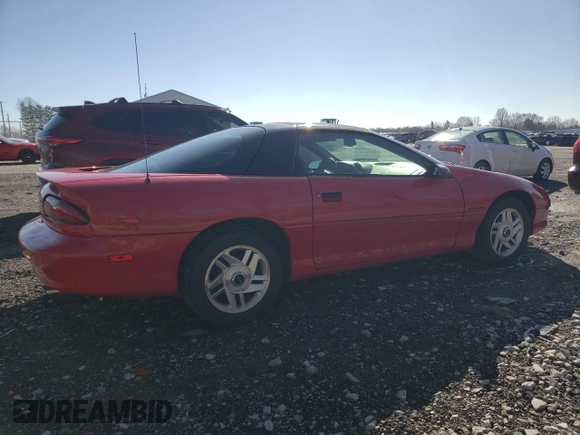 1994 Chevrolet Camaro z VIN 2G1FP22SXR2165249, wystawiony jako Copart lot #49333055 z przebiegiem 196 736 mil mil oraz Czysty tytuł • Clean title. Historia ofert i sprzedaży dostępna na DreamBid. Obrazek 3.