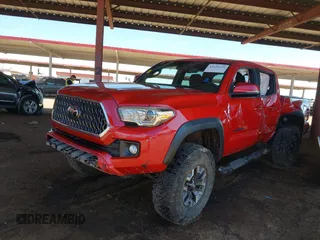 2018 Toyota Tacoma SR with VIN 3TMCZ5AN8JM141486, listed as a IAAI auction lot 42142145 with 54,851 mi miles and . Bid and sale history available at DreamBid. Image 6.