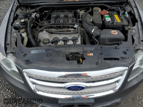 2012 Ford Taurus SEL z VIN 1FAHP2HW8CG124425, wystawiony jako Copart lot #50686415 z przebiegiem 172 480 mil mil oraz Szkoda całkowita • Salvage title. Historia ofert i sprzedaży dostępna na DreamBid. Obrazek 11.