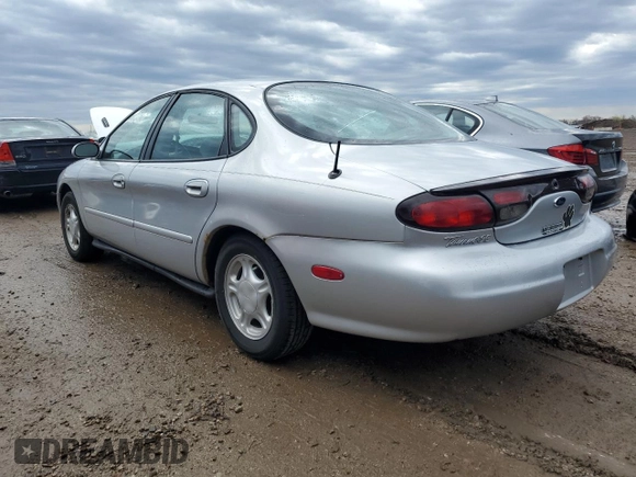 1999 Ford Taurus SE with VIN 1FAFP53U2XA134648, listed as a Copart auction lot 54305325 with 56,794 mi miles and Clean title. Bid and sale history available at DreamBid. Image 2.