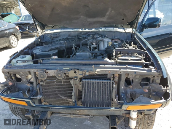 1995 Toyota Land Cruiser z VIN JT3DJ81W6S0106332, wystawiony jako Copart lot #47772055 z przebiegiem 214 499 mil mil oraz Szkoda całkowita • Salvage title. Historia ofert i sprzedaży dostępna na DreamBid. Obrazek 12.