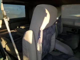 1998 GMC Safari z VIN 1GDDM19W5WB503552, wystawiony jako Copart lot #88247495 z przebiegiem 267 494 mil mil oraz Szkoda całkowita • Salvage title. Historia ofert i sprzedaży dostępna na DreamBid. Obrazek 11.