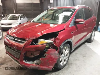 2014 Ford Escape Titanium with VIN 1FMCU9J9XEUD69589, listed as a IAAI auction lot 42031882 with 123,632 mi miles and . Bid and sale history available at DreamBid. Image 6.