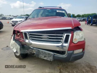 2010 Ford Explorer Sport Trac XLT z VIN 1FMEU3BE4AUF05128, wystawiony jako Copart lot #54847865 z przebiegiem Nie podano mil oraz Szkody całkowita. Historia ofert i sprzedaży dostępna na DreamBid. Obrazek 5.