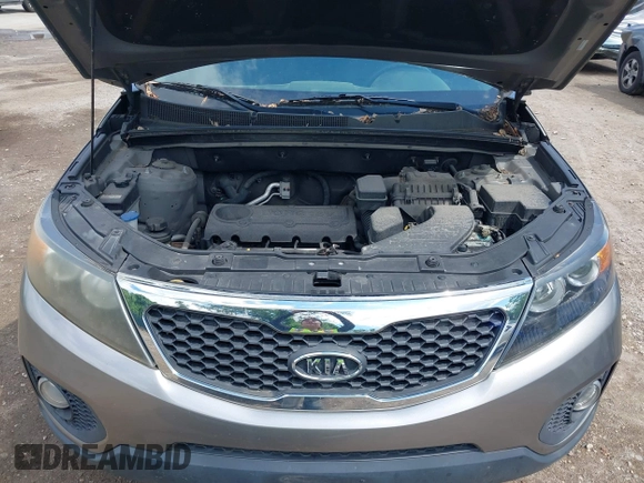 2011 Kia Sorento LX with VIN 5XYKTCA14BG056447, listed as a IAAI auction lot 42212972 with 207,258 mi miles. Bid and sale history available at carsss.com. Image 10.