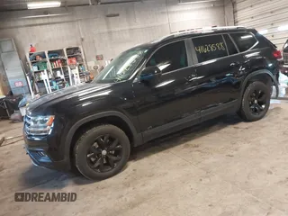 2019 Volkswagen Atlas SE with VIN 1V2LR2CAXKC599542, listed as a IAAI auction lot 41628588 with 59,377 mi miles and . Bid and sale history available at DreamBid. Image 2.